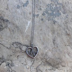 Beating heart sterling silver pendant necklace